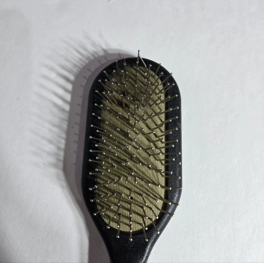 Black and Tan Dog Brush